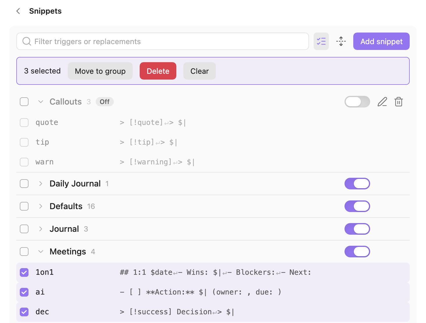 The Snippets page in selection mode: the Callouts group muted and dimmed with its toggle off, and three Meetings snippets selected with a bar offering Move to group, Delete and Clear