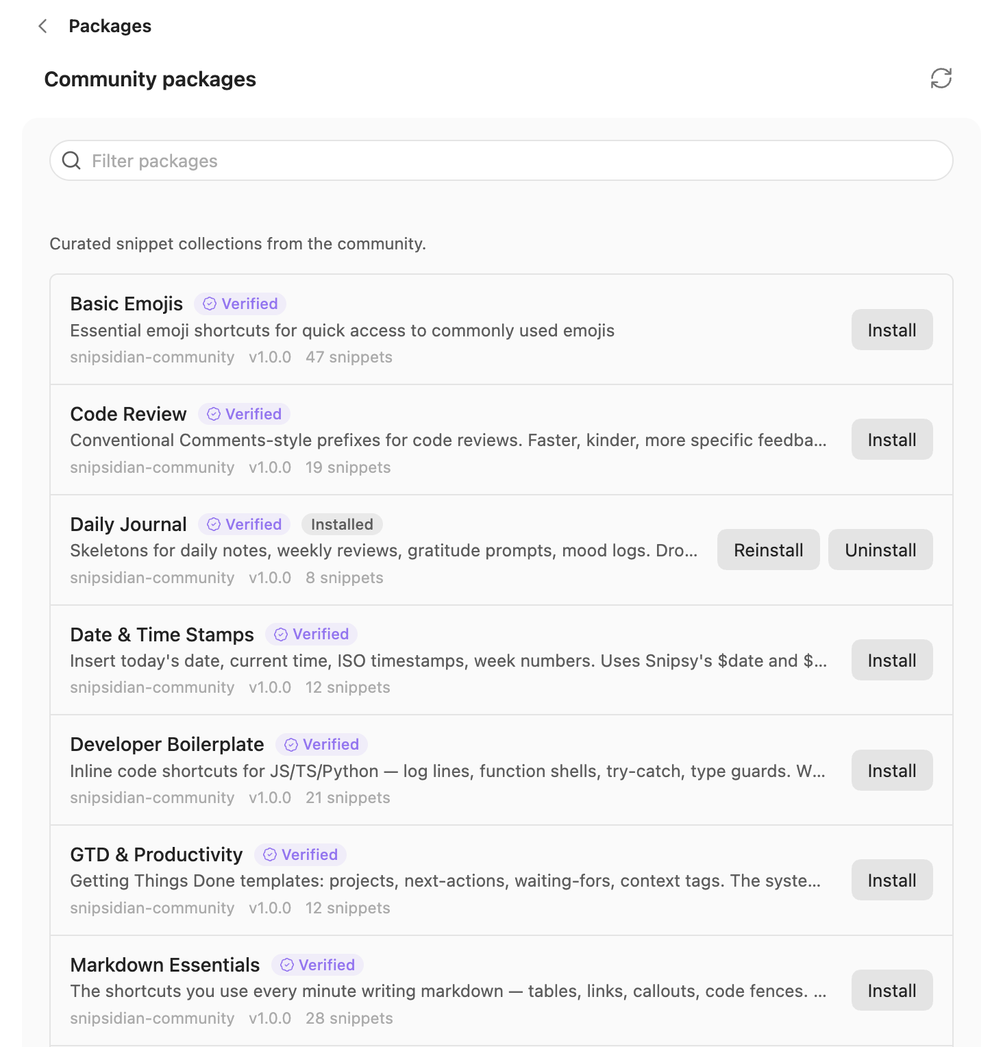 The Packages page: a filter box and a list of community packs, each with its description, author, version, snippet count and an Install button