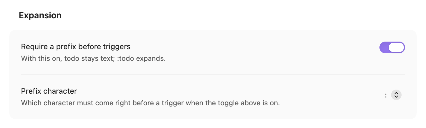 The Expansion settings: Require a prefix before triggers switched on, and the prefix character set to a colon
